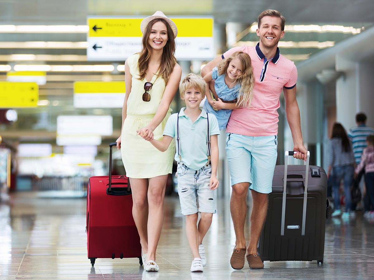 Family traveling together at the airport