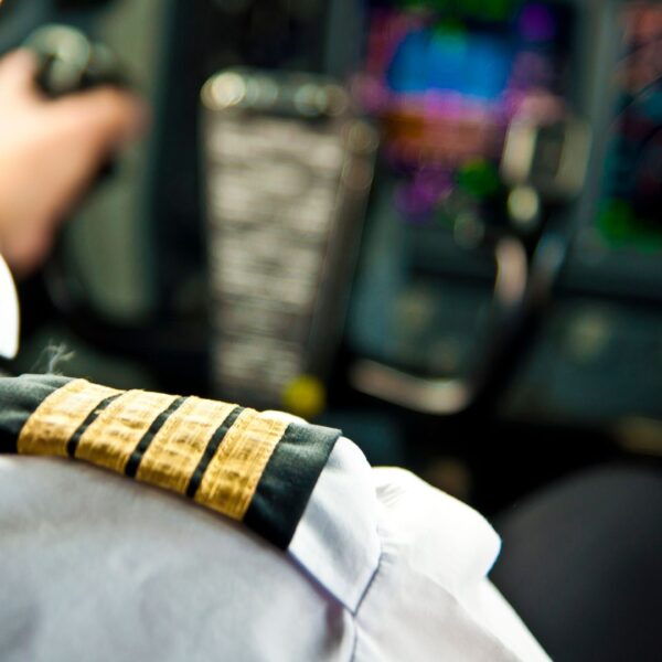 Close up of pilot credentials and bands