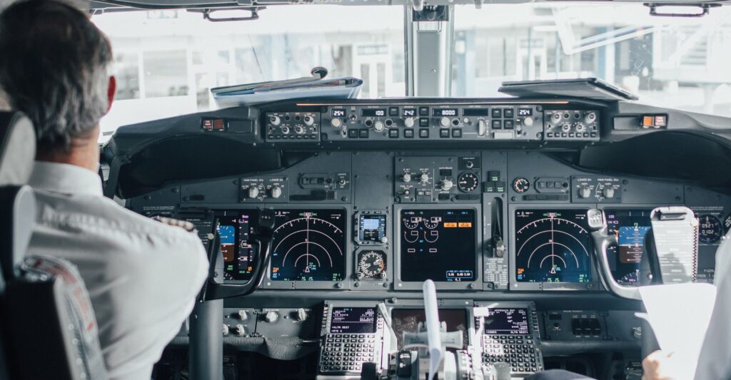 commercial plane cockpit at a gate