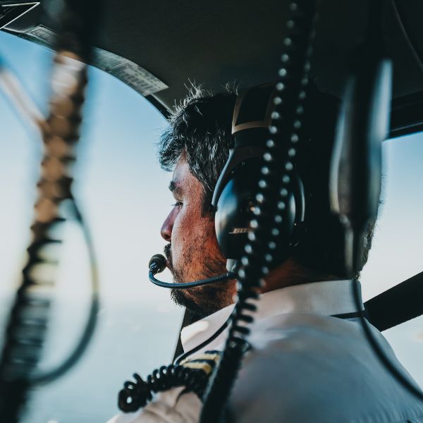 pilot speaking into headset