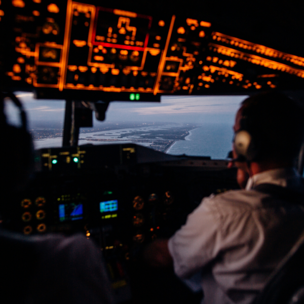pilot flying a plane